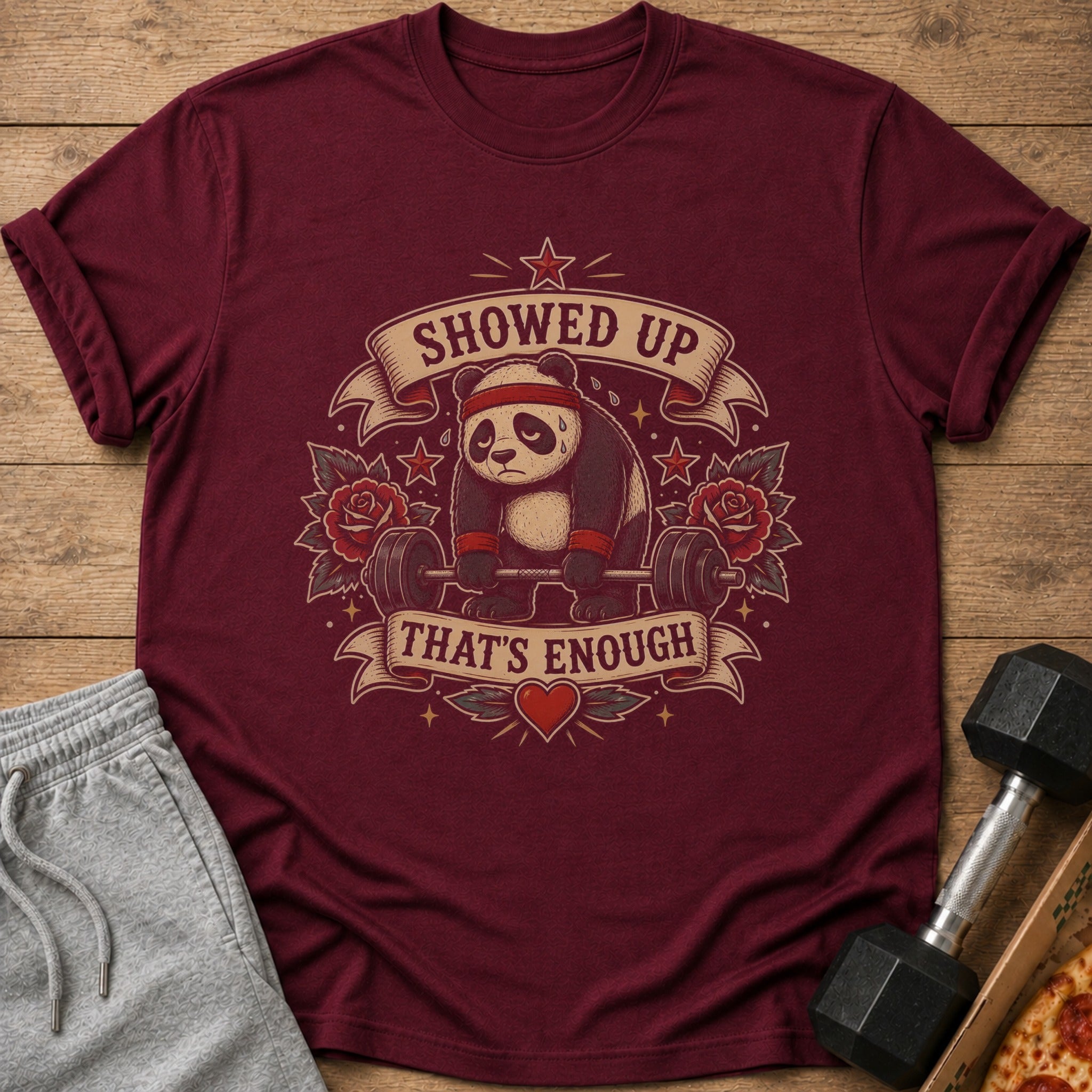 Maroon t-shirt with panda lifting barbell graphic and text "SHOWED UP THAT'S ENOUGH".