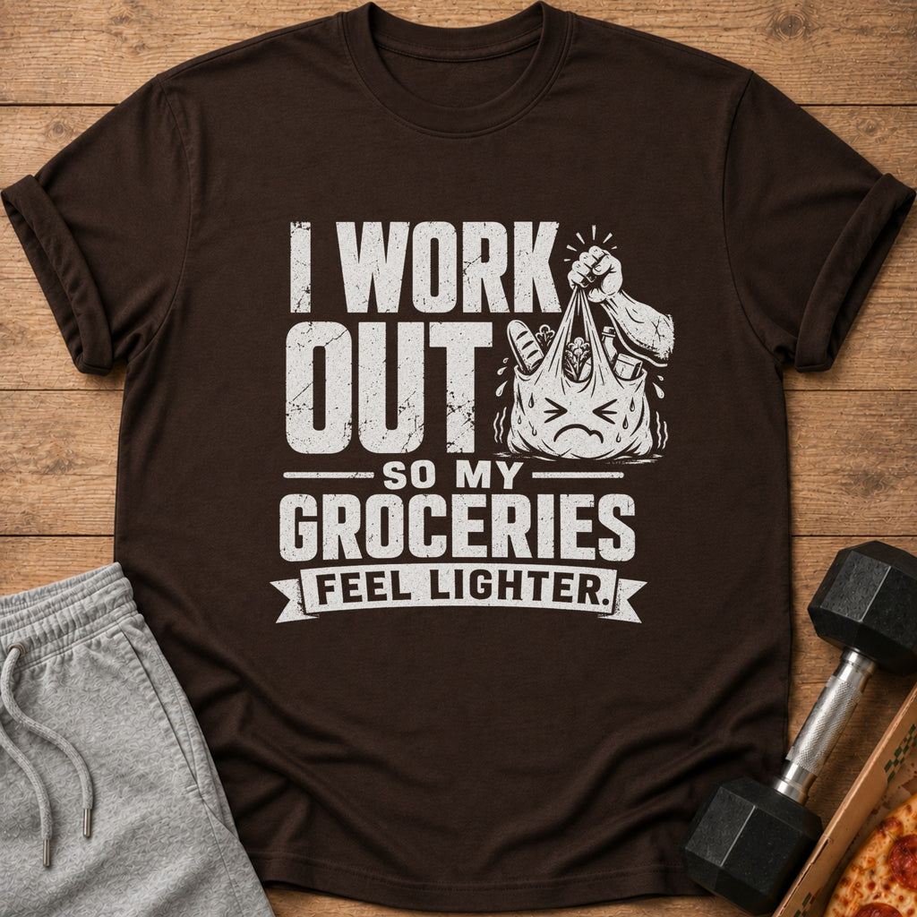 Brown t-shirt with text "I WORK OUT SO MY GROCERIES FEEL LIGHTER" and grocery bag graphic.