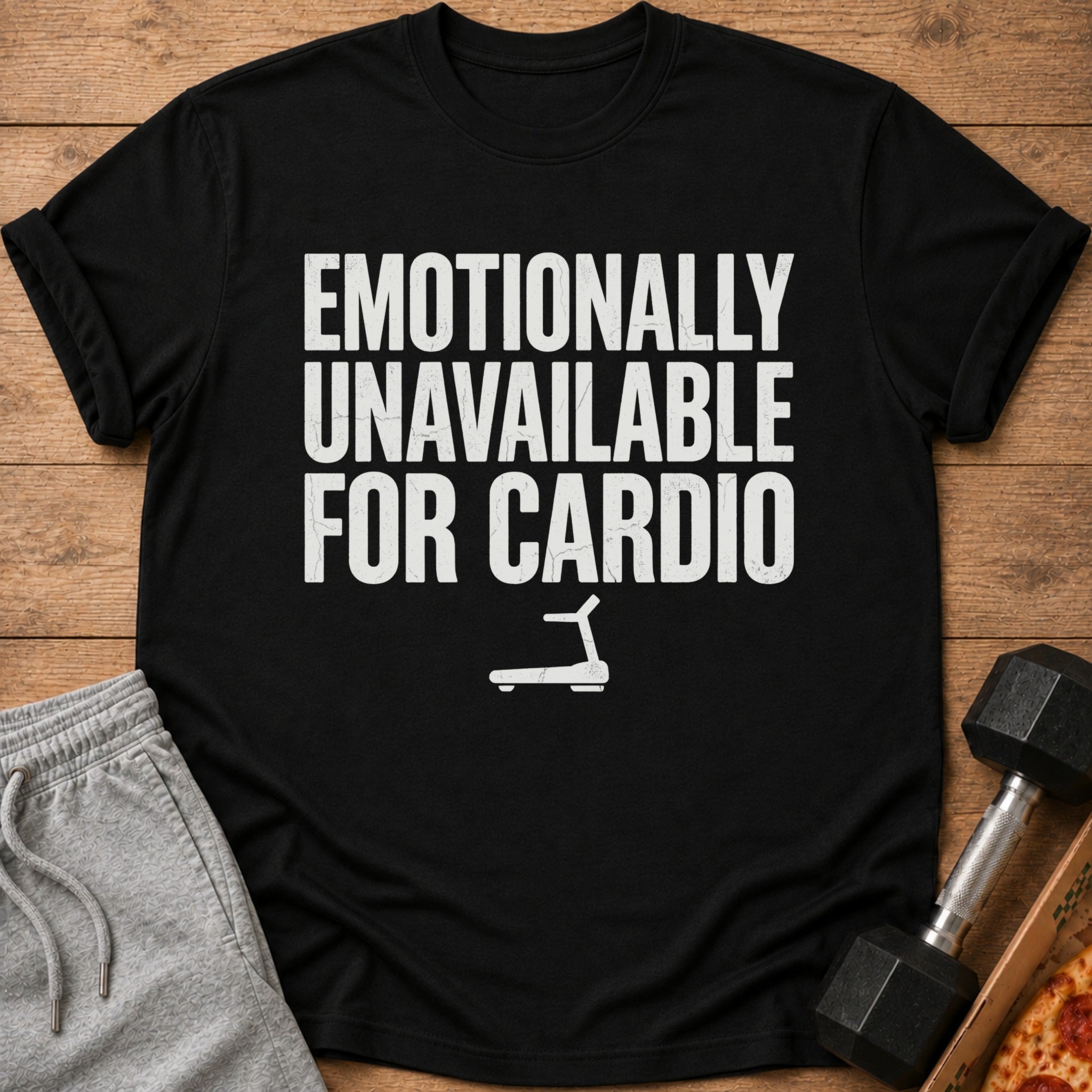Black t-shirt with "EMOTIONALLY UNAVAILABLE FOR CARDIO" text and treadmill icon.