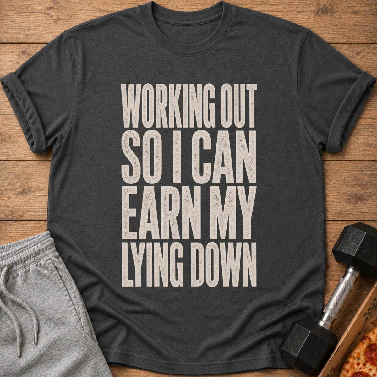 Dark gray t-shirt with "WORKING OUT SO I CAN EARN MY LYING DOWN" text.