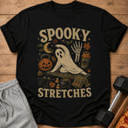 Black t-shirt with "Spooky Stretches" text and Halloween-themed yoga-related graphics.