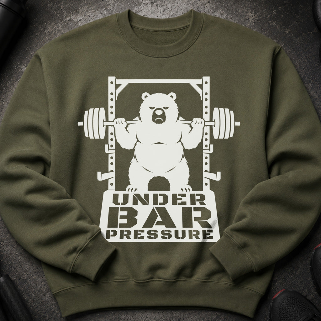 Olive green sweatshirt with white graphic of a bear lifting weights with text "UNDER BAR PRESSURE".