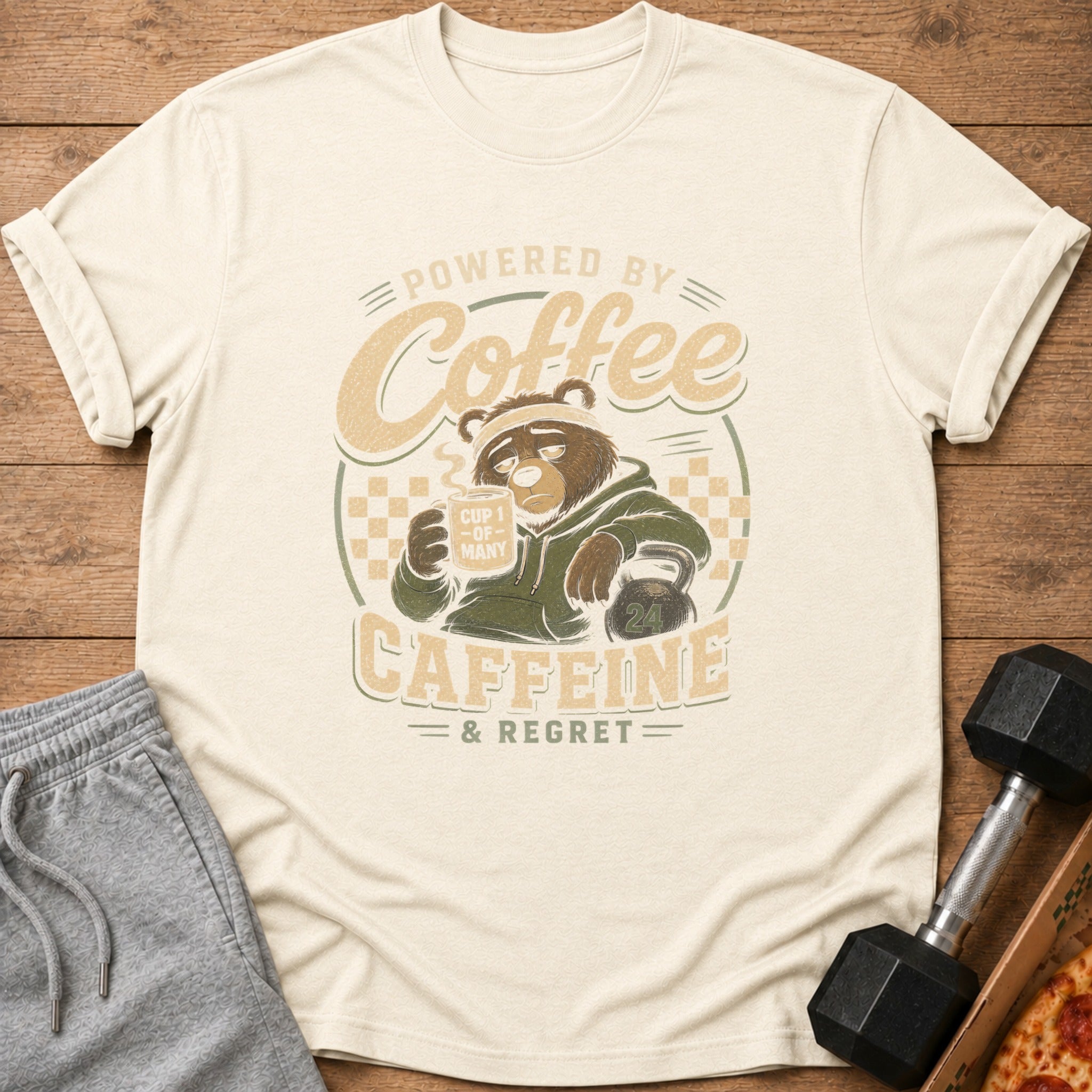T-shirt with a bear holding coffee, text "Powered by Coffee Caffeine & Regret".
