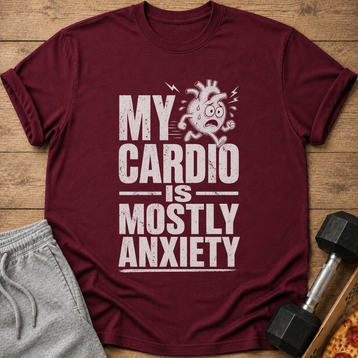 Maroon t-shirt with "My Cardio Is Mostly Anxiety" text and distressed cartoon heart graphic.