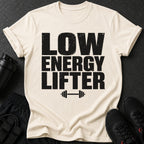 Cream t-shirt with "LOW ENERGY LIFTER" text and dumbbell graphic.