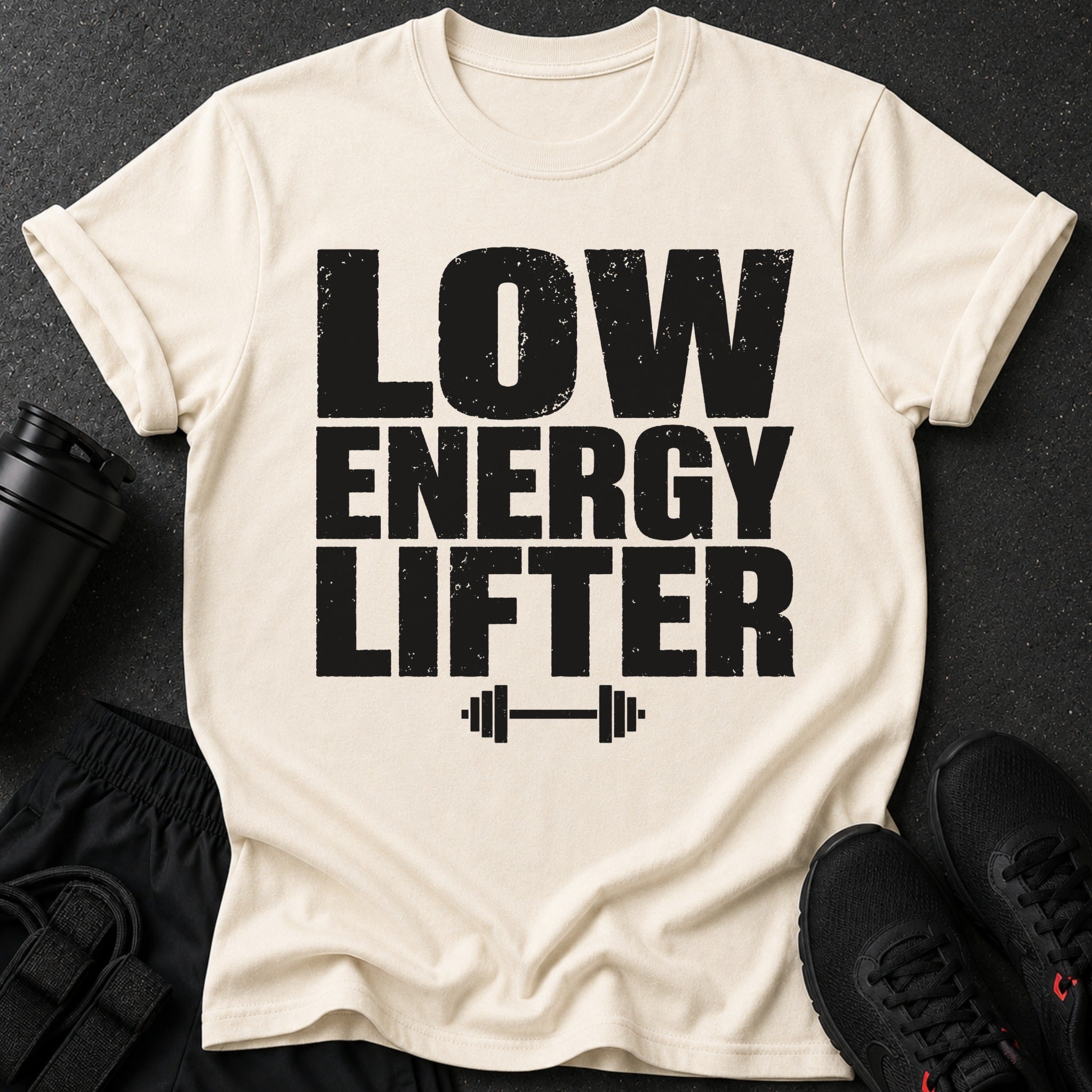 Cream t-shirt with "LOW ENERGY LIFTER" text and dumbbell graphic.
