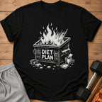 Black t-shirt with a white graphic of a dumpster fire labeled "DIET PLAN".