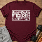Maroon t-shirt with white text: "I WORK OUT SO MY GROCERIES FEEL LIGHTER".
