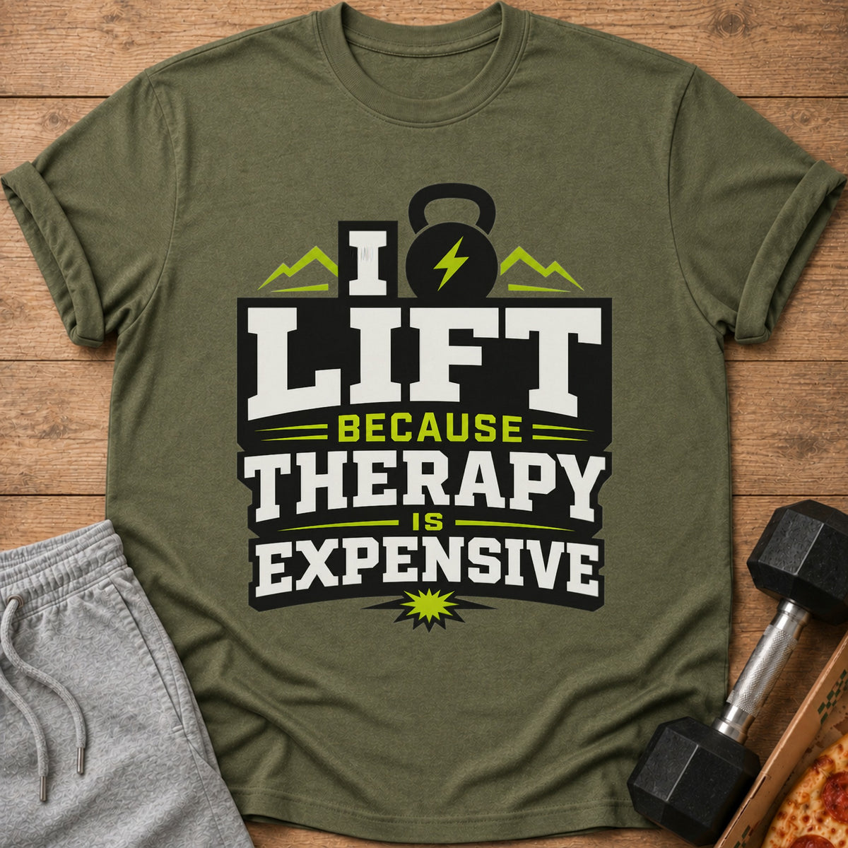 Green t-shirt with "I Lift Because Therapy Is Expensive" text and barbell graphics.