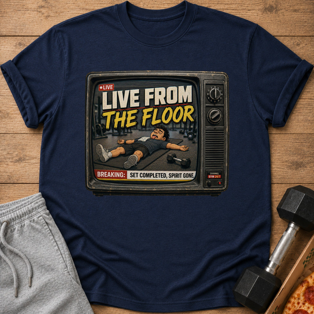 Navy t-shirt with graphic of tired person on gym floor, inside a retro TV screen.