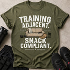 Olive t-shirt with "Training Adjacent. Snack Compliant." text and icons.