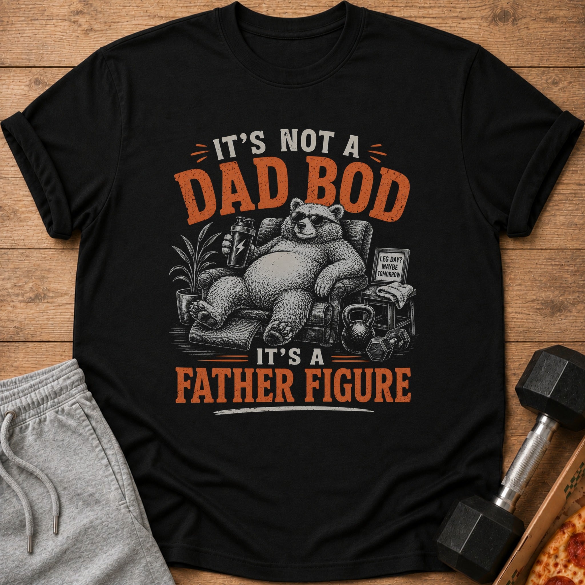 Black t-shirt graphic: "It's Not a Dad Bod, It's a Father Figure."