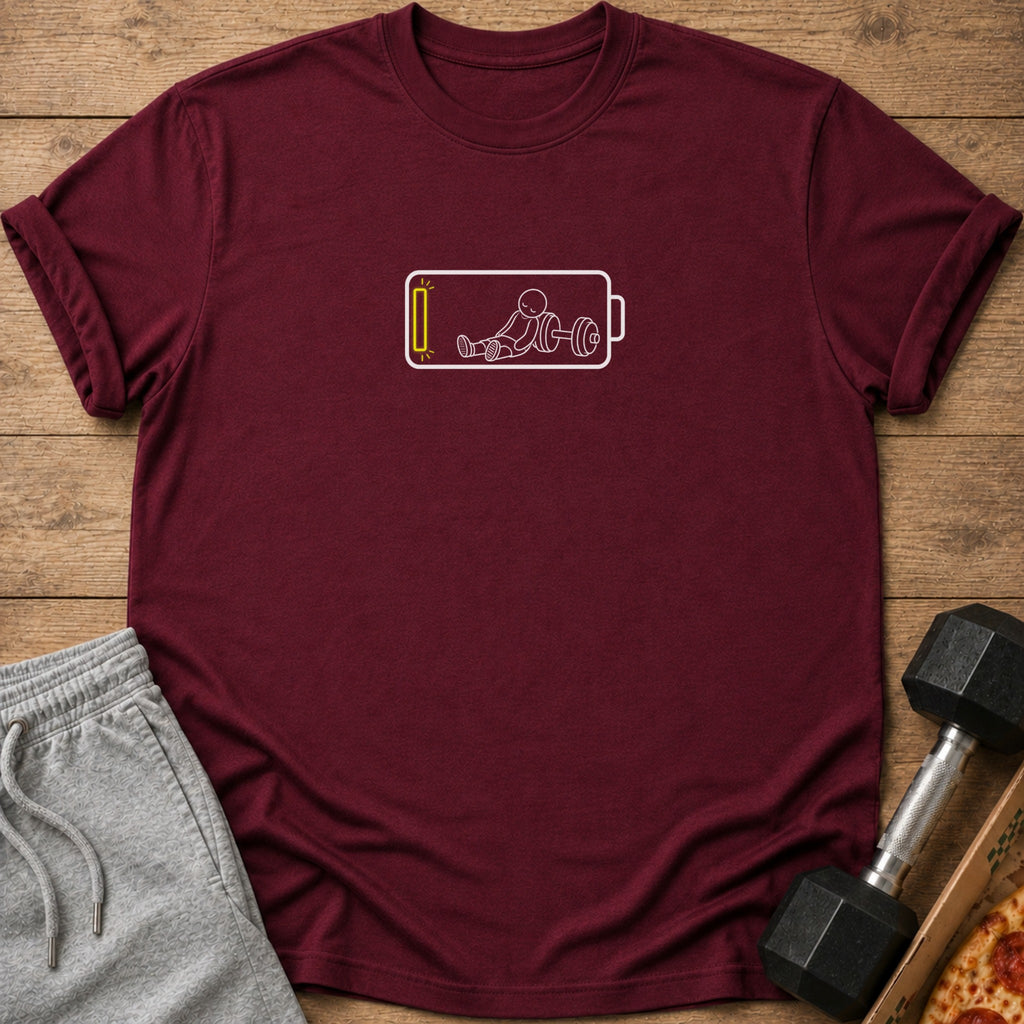Maroon t-shirt with a white outline graphic of a stick figure sitting inside a low battery icon.