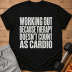 Black t-shirt with white text "WORKING OUT BECAUSE THERAPY DOESN'T COUNT AS CARDIO."