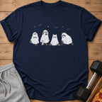Navy t-shirt with cartoon ghost animals, bats, and stars graphic.