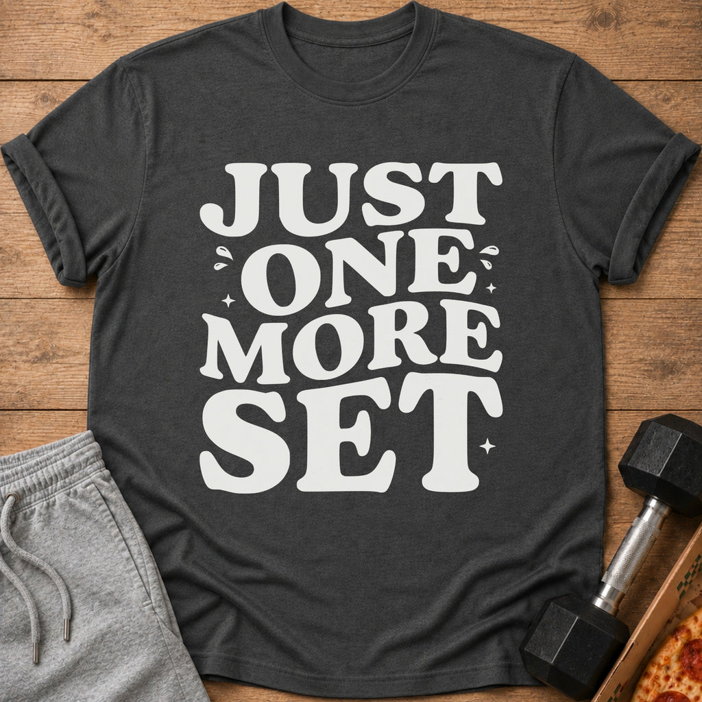 Dark grey t-shirt with white text reading "JUST ONE MORE SET".