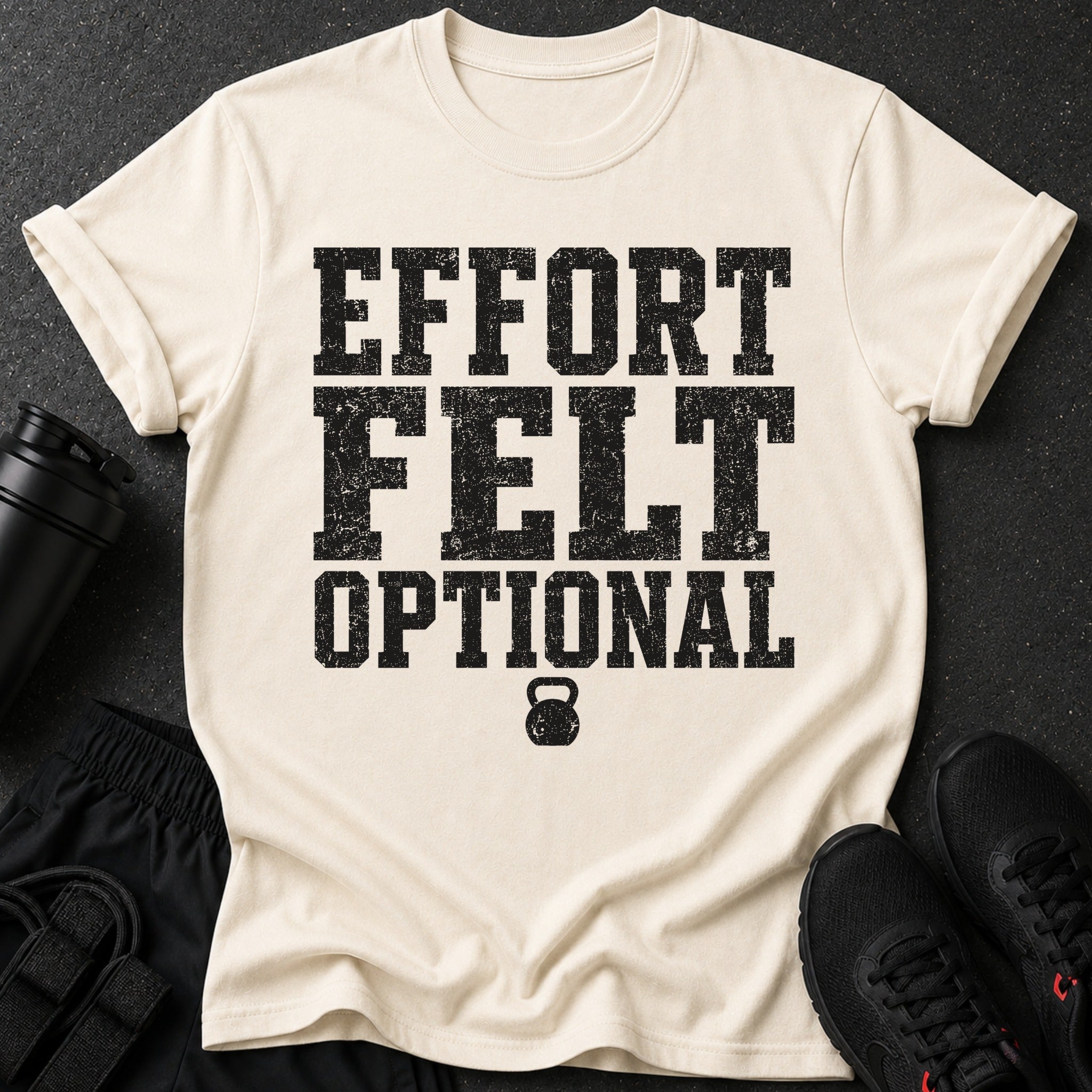 Cream t-shirt with "EFFORT FELT OPTIONAL" text and a kettlebell icon.
