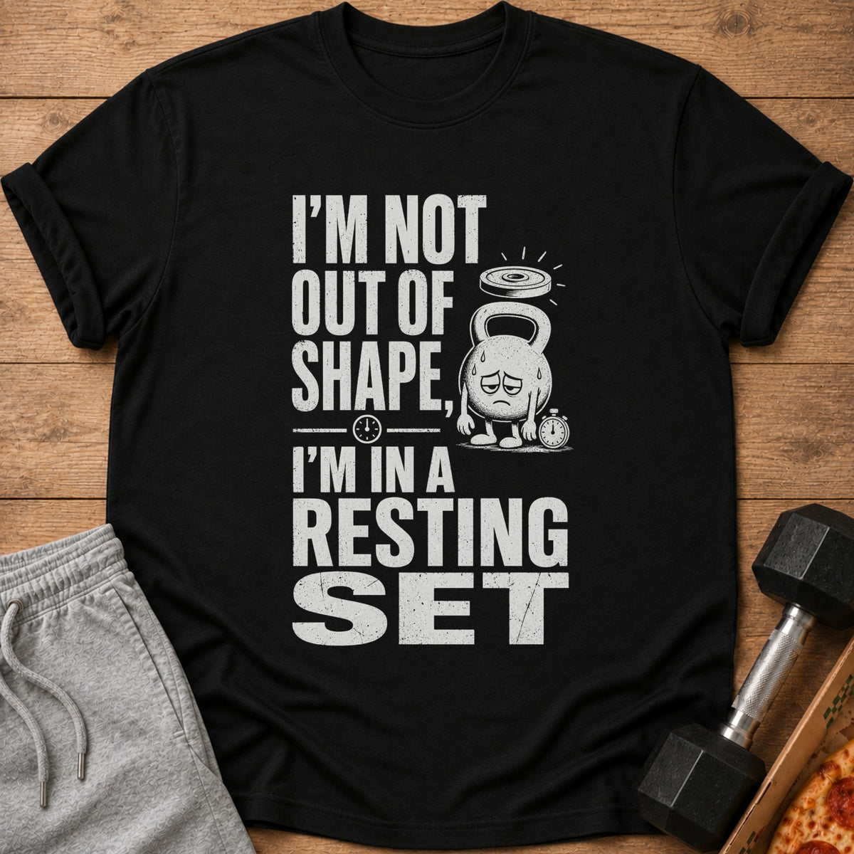 Black t-shirt with "I'm Not Out Of Shape, I'm In A Resting Set" text and graphic.