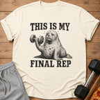 T-shirt with drawing of seal lifting dumbbell and text "THIS IS MY FINAL REP".