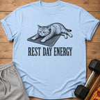 Light blue t-shirt with a grumpy cat illustration and "Rest Day Energy" text.