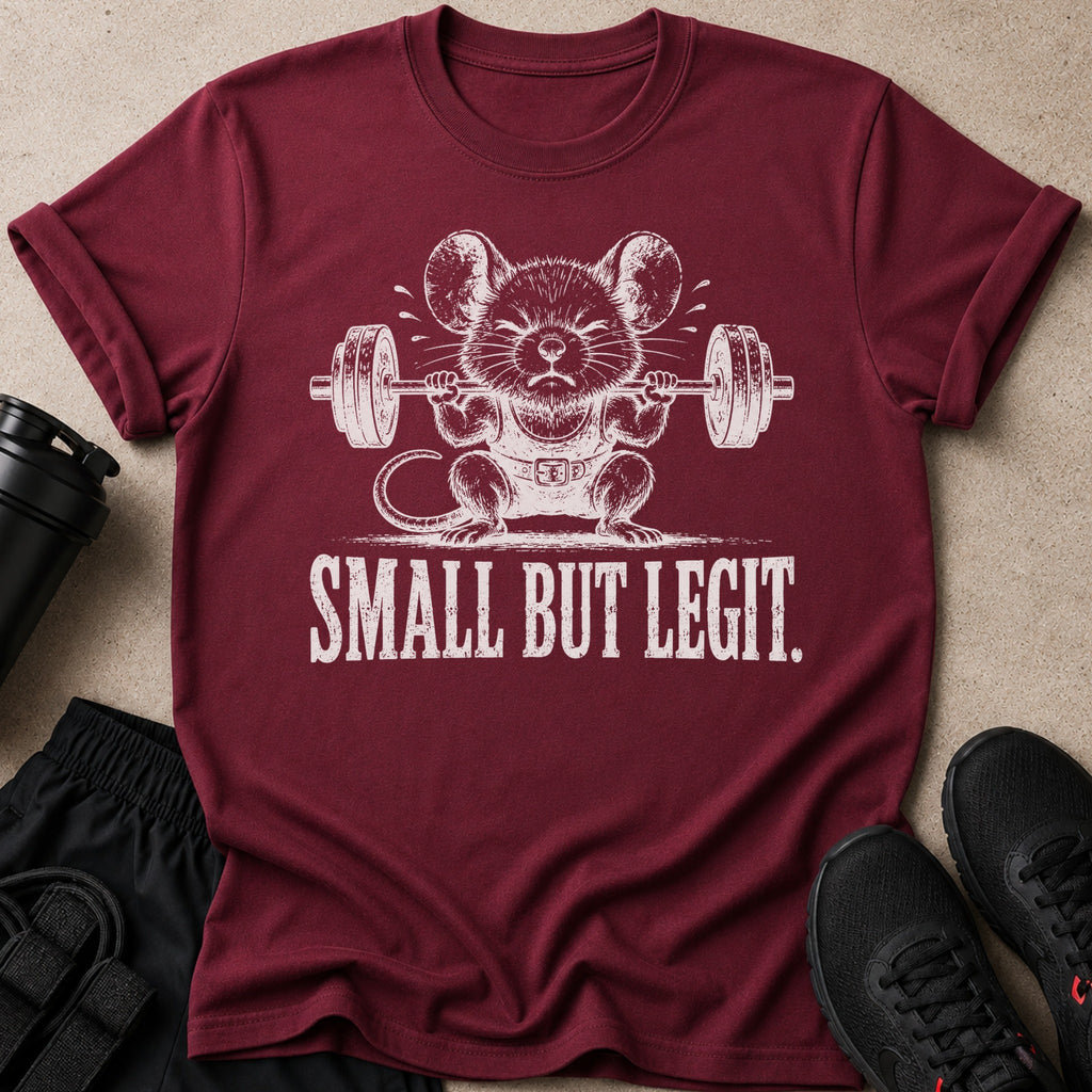 Maroon t-shirt with white graphic of a mouse lifting weights and text "SMALL BUT LEGIT."