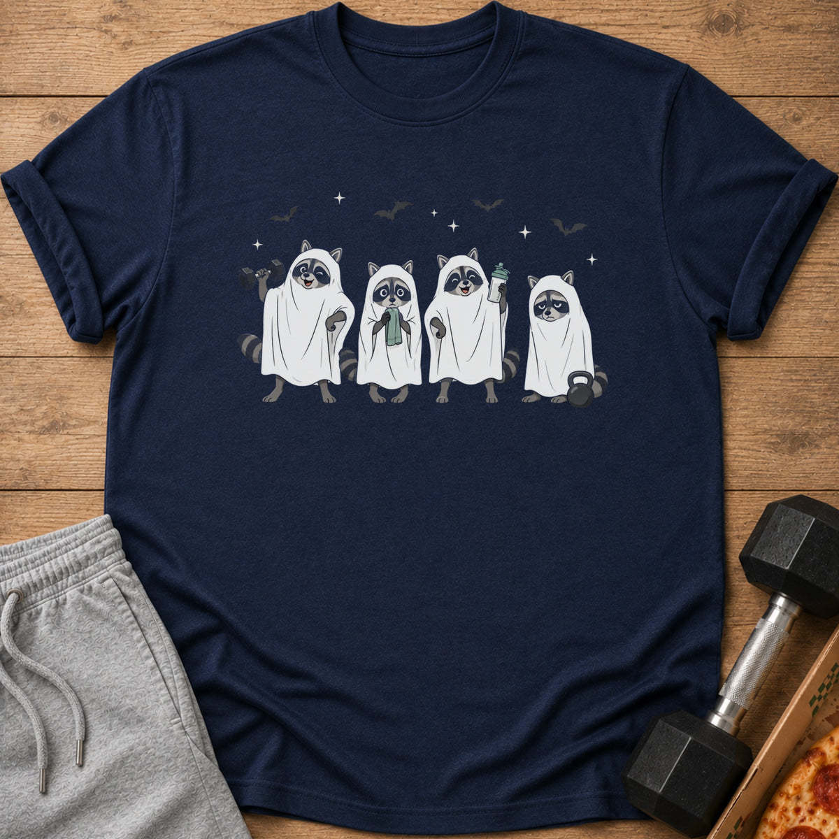 Four raccoons dressed as ghosts holding gym equipment, with bats and stars.