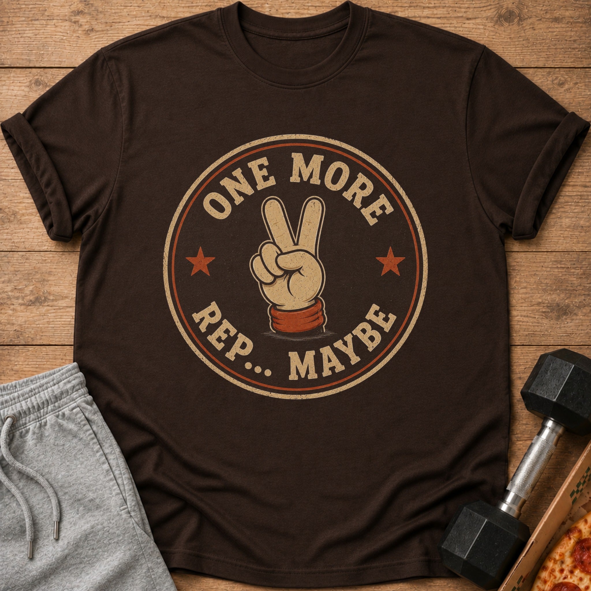 Brown t-shirt with a vintage graphic of a hand making a peace sign and text.