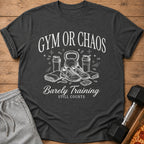 Dark gray t-shirt with "GYM OR CHAOS Barely Training STILL COUNTS" and fitness graphics.