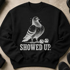 Black sweatshirt with a drawing of a pigeon and a dumbbell, text reads "SHOWED UP."