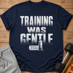 Navy t-shirt with white distressed text "TRAINING WAS GENTLE" and gym icons.