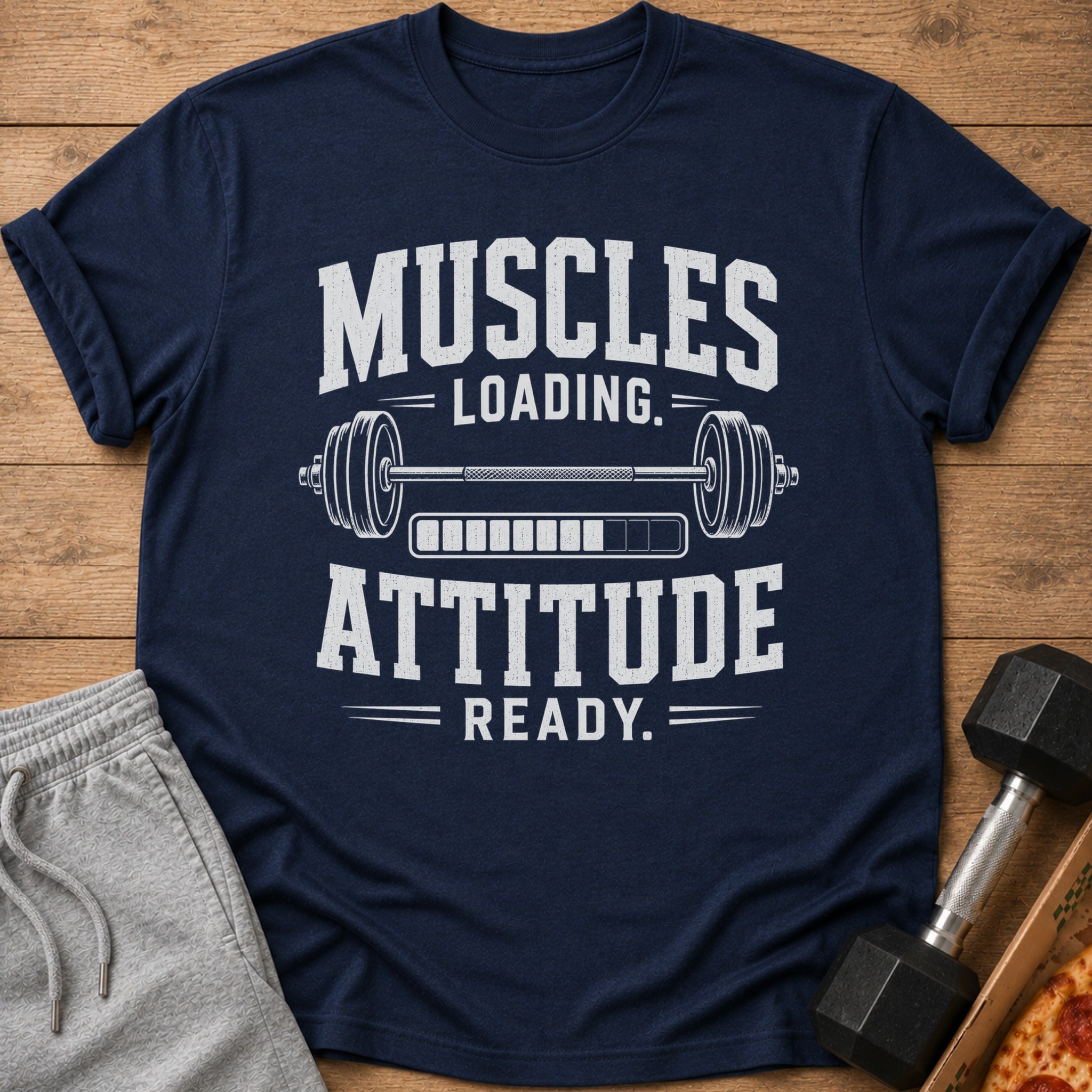 Navy t-shirt with "Muscles Loading, Attitude Ready" text, barbell, and progress bar.