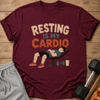 Maroon t-shirt with "Resting Is My Cardio" text and sleeping figure.