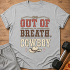 Grey t-shirt with "Out Of Breath, Cowboy" text and a cowboy hat graphic.