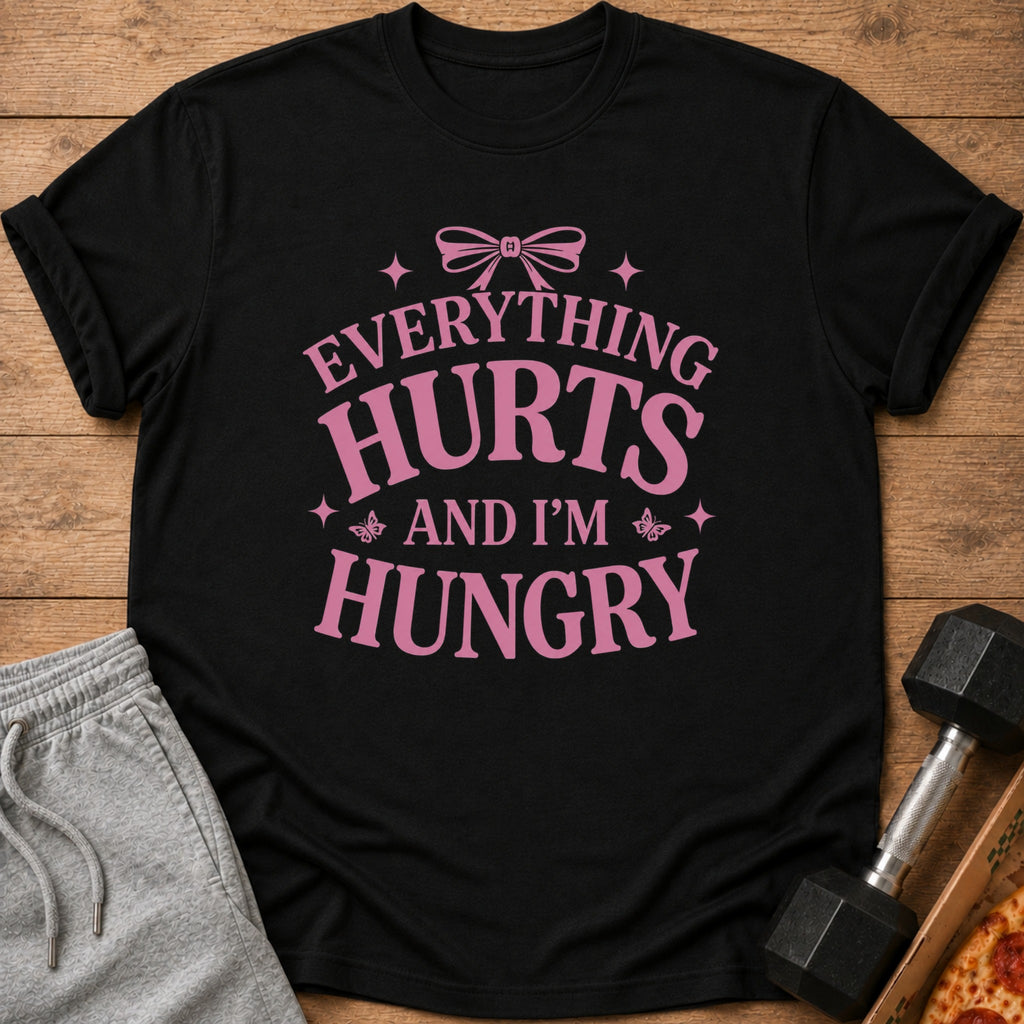 Black t-shirt with pink text "Everything Hurts And I'm Hungry"