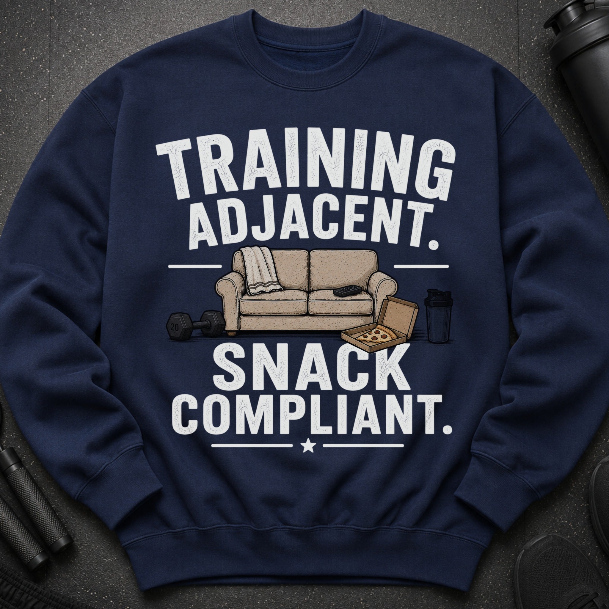 Navy sweatshirt with "Training Adjacent. Snack Compliant." text and illustrative icons.