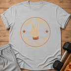 Gray t-shirt with a graphic of a hand giving a peace sign and text "ONE MORE REP... MAYBE".