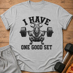 Grey t-shirt with a goat lifting weights, text "I HAVE ONE GOOD SET".