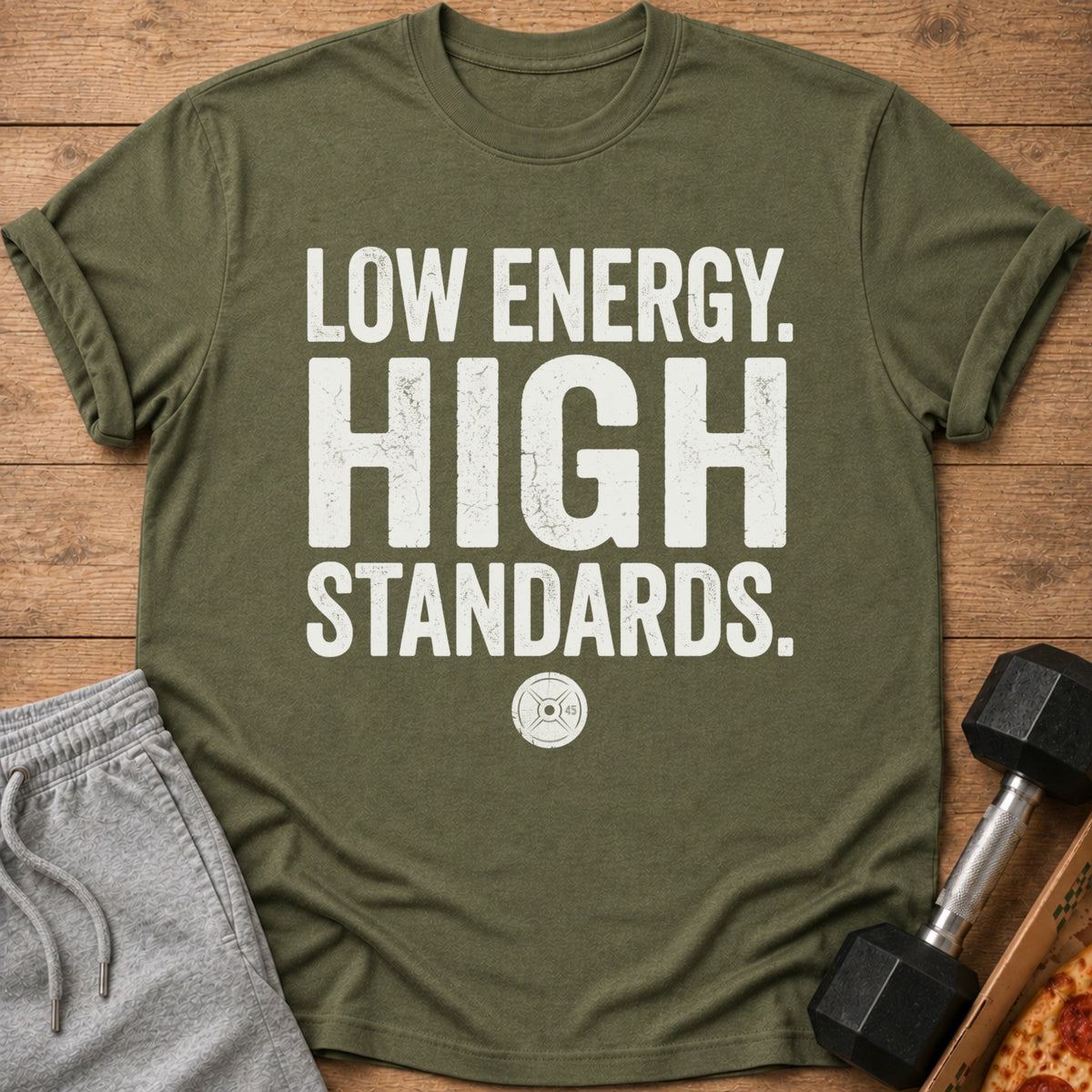Olive green t-shirt with distressed white text "LOW ENERGY. HIGH STANDARDS."