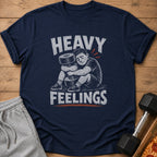 Navy t-shirt with distressed graphic of man hugging barbell, text HEAVY FEELINGS.