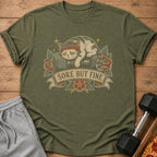 Green t-shirt with a distressed cat graphic and the text "Sore But Fine."