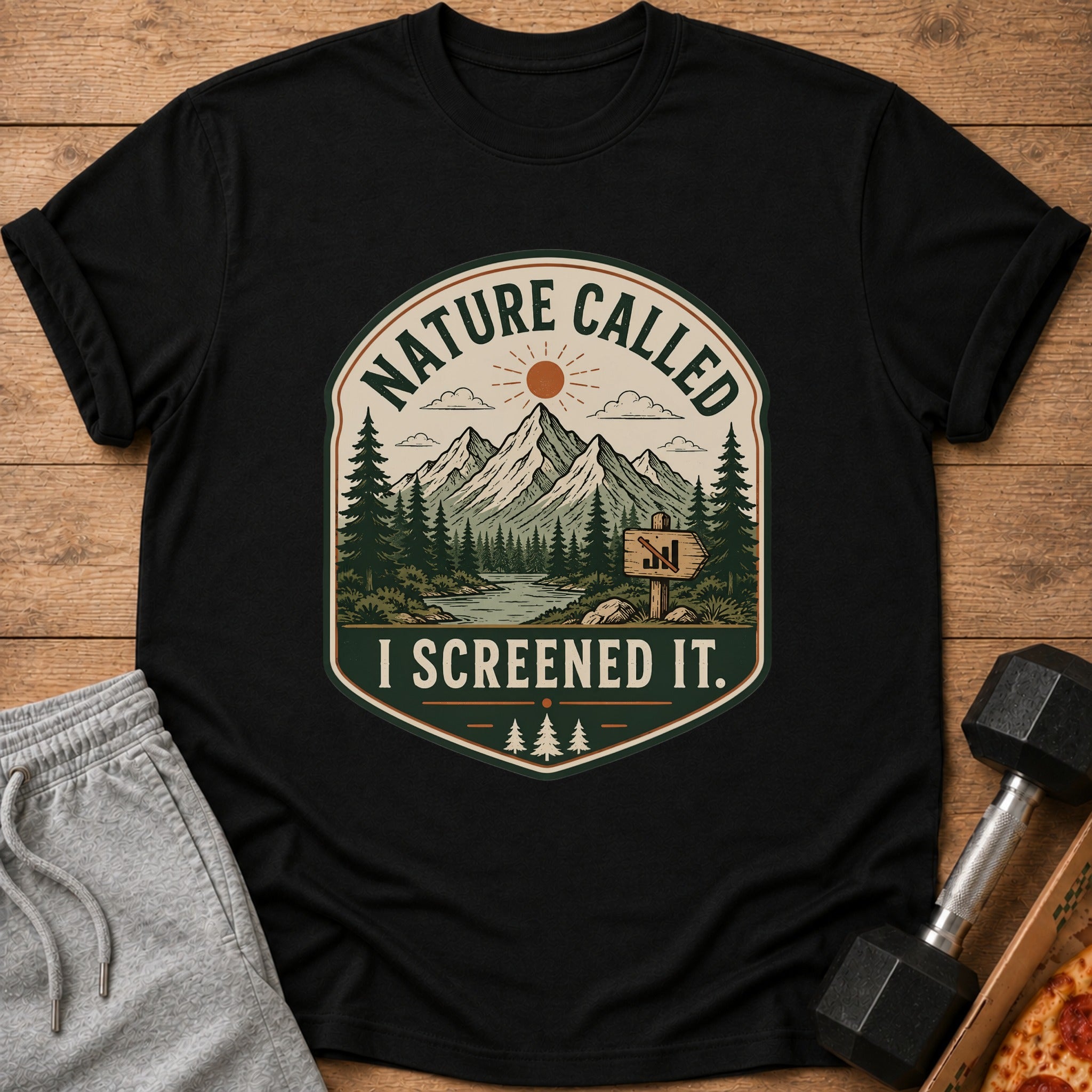 Black t-shirt with "Nature Called I Screened It" text and mountain scene graphic.