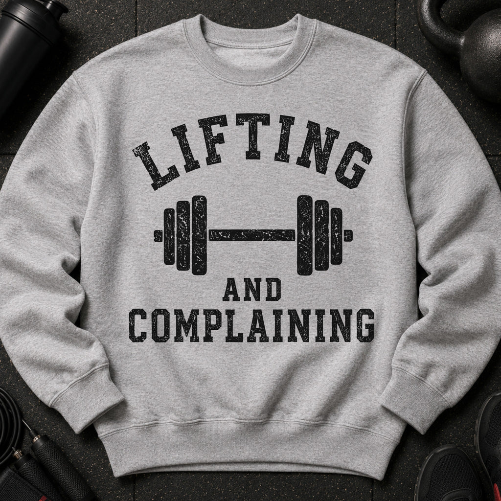 Grey sweatshirt with bold black text: "LIFTING AND COMPLAINING" above a barbell.