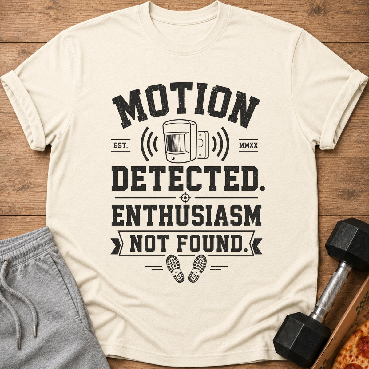 Light t-shirt with black text: MOTION DETECTED. ENTHUSIASM NOT FOUND.