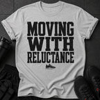 Grey t-shirt with black distressed text "MOVING WITH RELUCTANCE" and a sneaker graphic.