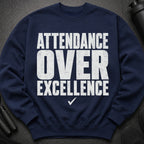 Navy sweatshirt with white text: "ATTENDANCE OVER EXCELLENCE" and a checkmark.