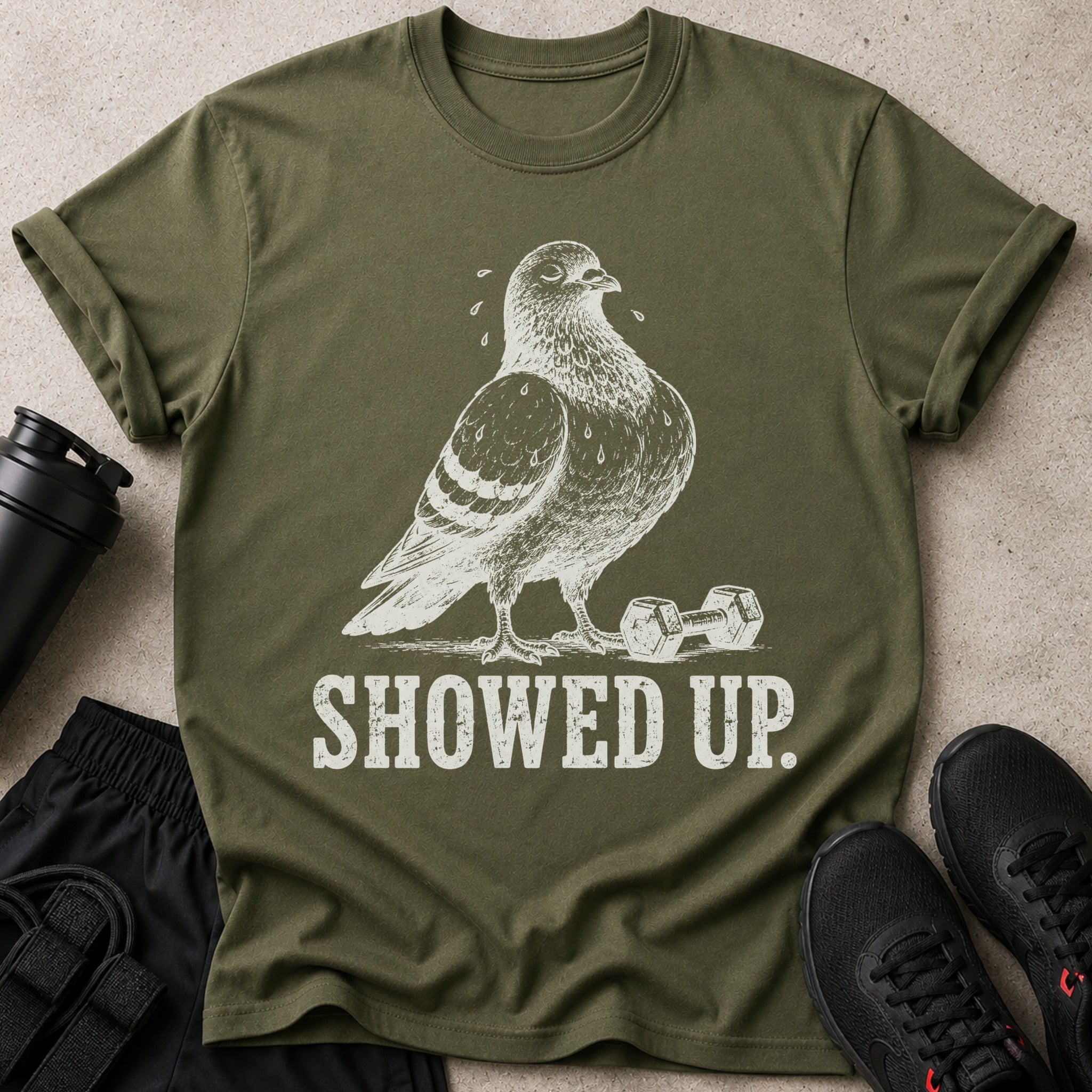 Olive green t-shirt with white distressed graphic of a pigeon and dumbbell.