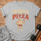 Gray t-shirt with "TRAINING FOR PIZZA" text and cartoon of a muscular man holding pizza.