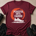 Maroon t-shirt with "PEACEFUL UNTIL CARDIO" text and a running shoe graphic.