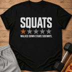 Black t-shirt with "SQUATS" and stars graphic, "walked down stairs sideways."