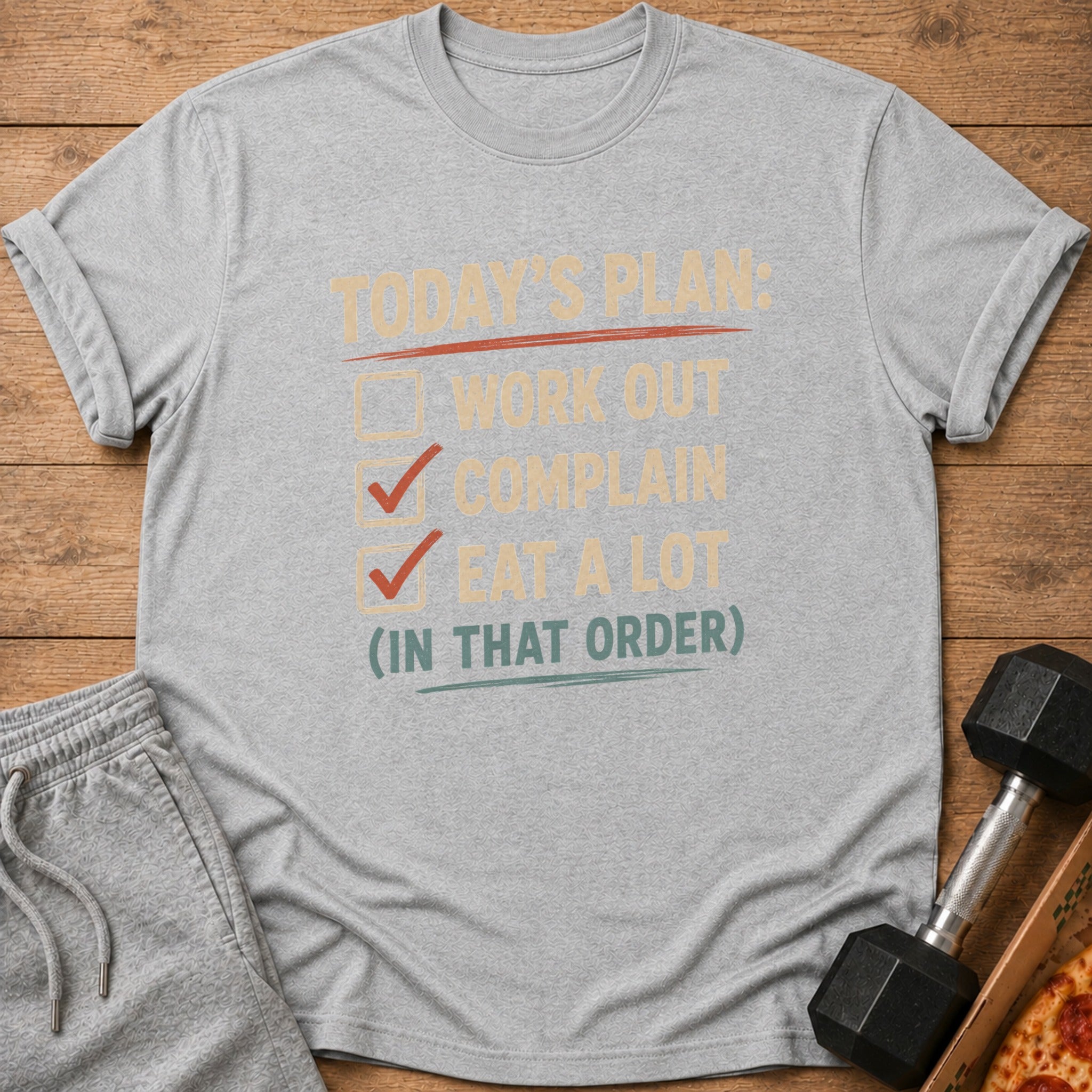Grey t-shirt with text "Today's Plan: Work Out, Complain, Eat A Lot (In That Order)".